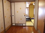 延楽(富山県黒部市、宇奈月温泉)の部屋の入口から和室